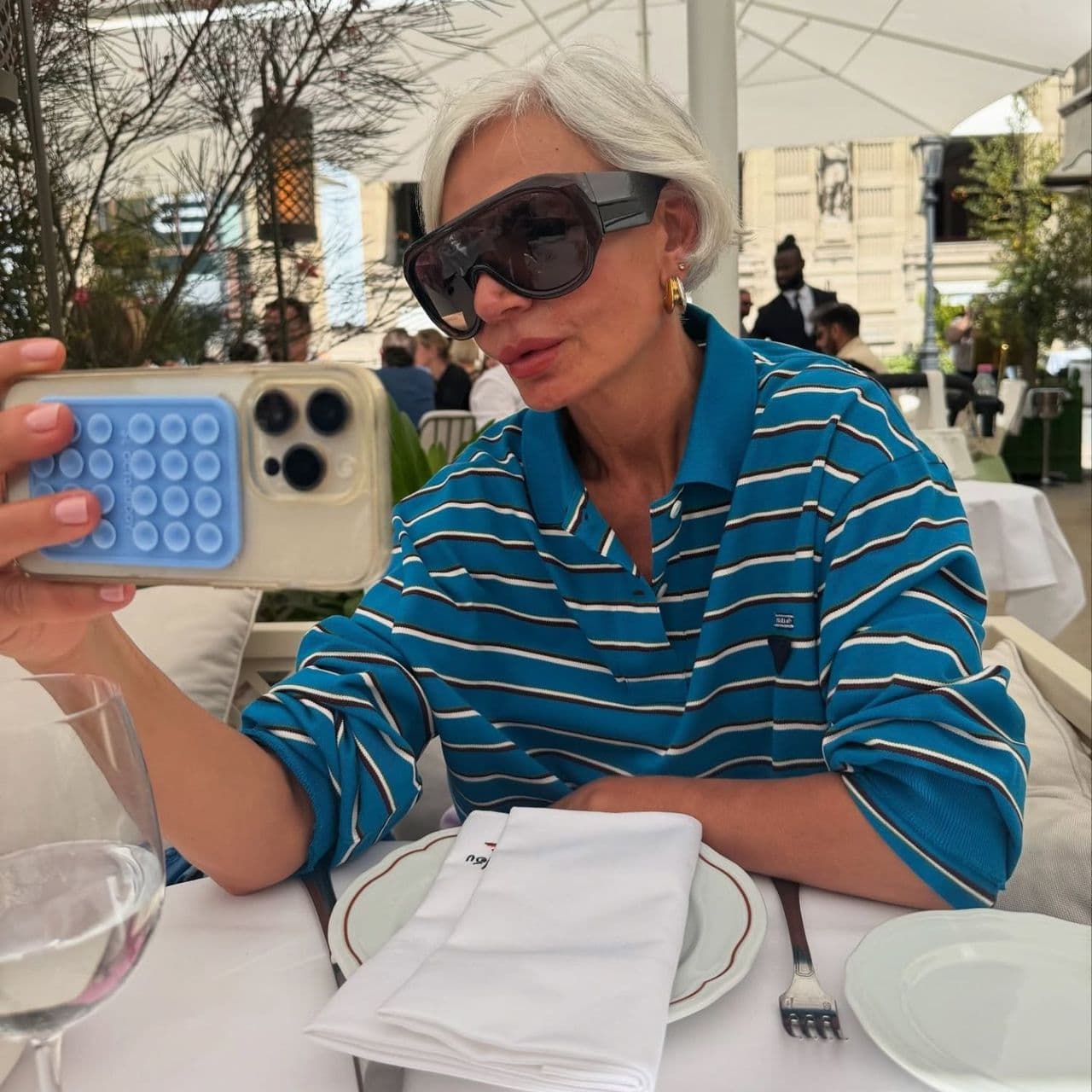 White Tees Are Fine, But in NYC, Cool Girls Know Jeans Look Better With This Spring Shirt Trend